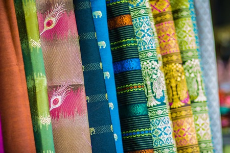Colorful of native thai style silk. Beautiful handmade woven fabrics thai silk fabric textured.