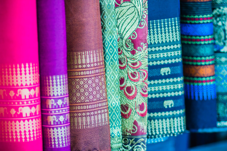Colorful of native thai style silk. Beautiful handmade woven fabrics thai silk fabric textured.の写真素材