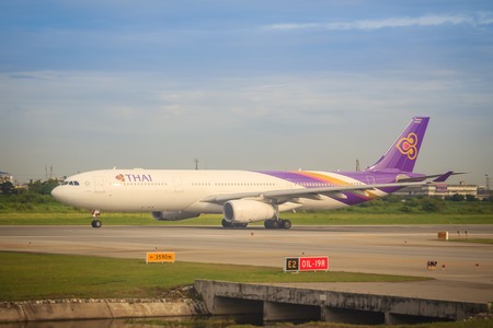 Bangkok, Thailand - August 9, 2017: Thai airways airplane is taxiing on runway before taking-off at Suvarnabhumi international airport.のeditorial素材