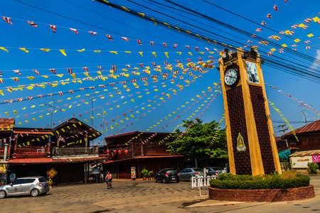 Phichit, Thailand - March 18, 2018: Clock Tower at Wangkrod old market, a charming alley flanked by...