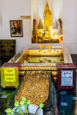 Saraburi, Thailand - March 22, 2018: Golden Buddha footprint and Buddha image in the pavilion on the hilltop at Wat Phraputthachai temple, Saraburi, Thailand.のeditorial素材
