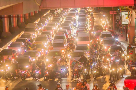 Bangkok, Thailand - December 20, 2017: Heavy traffic jams in Bangkok city with row of cars and...