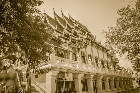 Beautiful Buddhist church with naga roof at at Wat Ku Tao (Temple of the Gourd Pagoda) in Chiang Mai, Thailand.の写真素材