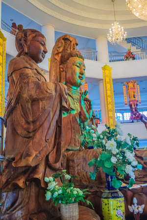 Beautiful wood statue of Guan Yin at Huay Pla Kang Temple, Chiang Rai, Thailand. Guan Yin is a female Bodhisattva in Thai Buddhism, which means someone that reached enlightenment.のeditorial素材