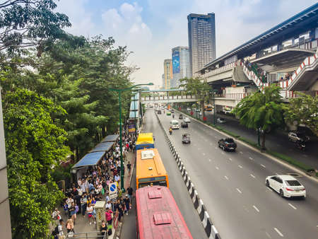 Bangkok, Thailand - February 02, 2018: Crowd of passengers are queuing for bus at Phahon Yothin Road, interchange of Mochit BTS sky train station and Chatuchak MRT subway station.のeditorial素材