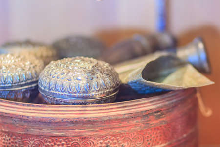 Old Thai silver bowl or Khan Maak in Thailand, a wedding ceremony accessories or engagement ceremony with betel, dowry, which the groom arranged to wear a bowl to pay respect to the bride's guardian.の写真素材