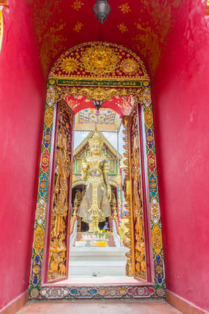Beautiful art of Buddha image, religious places and religious objects in Myanmar mixed with Lanna style at Wat Ming Muang Buddhist temple, Chiang Rai, Thailand. Mixed Lanna and Burmese arts.の写真素材