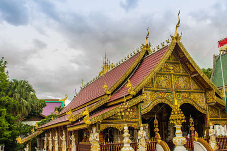 Beautiful art, religious places and religious objects in Myanmar mixed with Lanna style at Wat Ming Muang Buddhist temple, Chiang Rai, Thailand. Mixed Lanna and Burmese arts.の写真素材