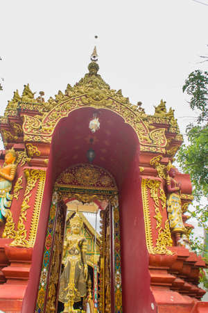 Beautiful art of Buddha image, religious places and religious objects in Myanmar mixed with Lanna style at Wat Ming Muang Buddhist temple, Chiang Rai, Thailand. Mixed Lanna and Burmese arts.の写真素材