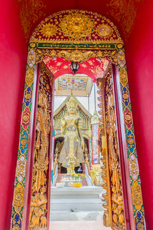 Beautiful art of Buddha image, religious places and religious objects in Myanmar mixed with Lanna style at Wat Ming Muang Buddhist temple, Chiang Rai, Thailand. Mixed Lanna and Burmese arts.の写真素材