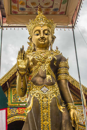Beautiful art of Buddha image, religious places and religious objects in Myanmar mixed with Lanna style at Wat Ming Muang Buddhist temple, Chiang Rai, Thailand. Mixed Lanna and Burmese arts.の写真素材