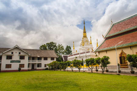 Beautiful landscape and white gold pagoda of Wat Jedyod, Chiang Rai, Thailand. Wat Chet Yot is a temple that has been renovated from the remains of an ancient temple.の写真素材