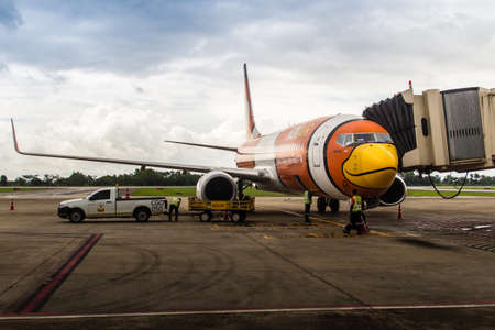 Bangkok, Thailand - June 13, 2017: NokAir airplane is parking at the gate wait for the boarding passenger at Suvarnabhumi International Airport, Thailand. Nok Air is a low-cost airline in Thailand.のeditorial素材