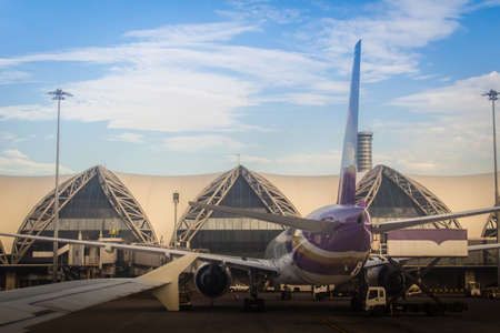 Bangkok, Thailand - June 13, 2017: Terminal building with the airplanes at Suvarnabhumi international airport, Bangkok, Thailand.のeditorial素材