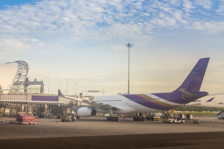 Bangkok, Thailand - June 13, 2017: Terminal building with the airplanes at Suvarnabhumi international airport, Bangkok, Thailand.のeditorial素材