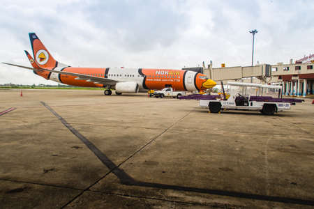 Bangkok, Thailand - June 13, 2017: NokAir airplane is parking at the gate wait for the boarding passenger at Suvarnabhumi International Airport, Thailand. Nok Air is a low-cost airline in Thailand.のeditorial素材