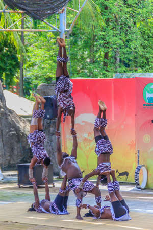 Bangkok, Thailand - September 22, 2018: Funny acrobatic kenya show at Dusit public zoo (now closed), Bangkok, Thailand.のeditorial素材