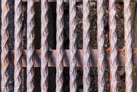 background of thick metal twisted steel rods.の写真素材