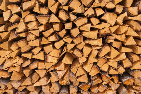 The pile of split logs. close up.の写真素材