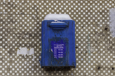 Old blue mailbox. Inscription: the letters are made: Monday. Tuesday. Environment. Thursday. Friday....