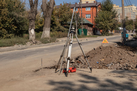 Building surveying equipment theodolite level tool during the repair of the roadway. Tula region. Russiaの写真素材