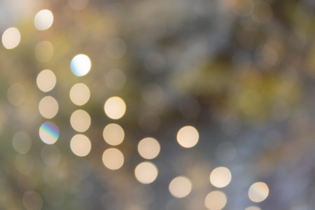 festive Christmas abstract background with bokeh lights and stars. holiday Christmas and new yearの写真素材