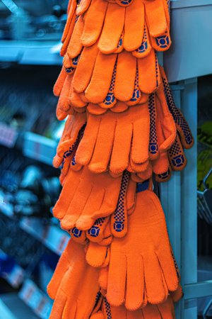 Trade in construction gloves. selling gloves to protect your hands in the supermarket, close upの写真素材