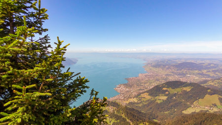 Beautiful summer landscape of lake Leman, top view from the mountainside, end of Montreux...