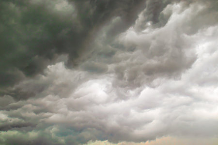 low gray clouds in the sky before the rain