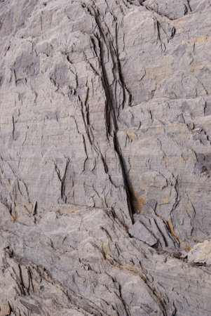 Layered rock in the Swiss Alps as background.の写真素材