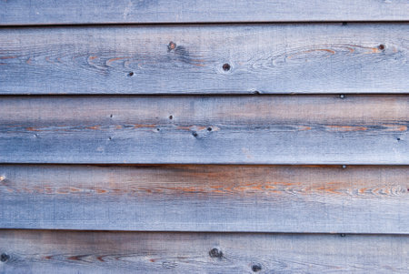 Texture of gray darkened old wooden wall.の写真素材