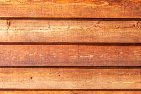 The texture of the wooden wall is made of pine floor boards.の写真素材