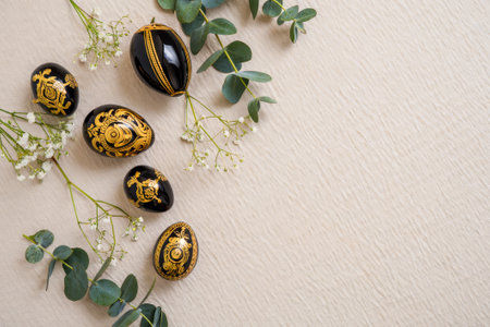 Decorative black eggs with floral design on beige background. generated by aiの素材