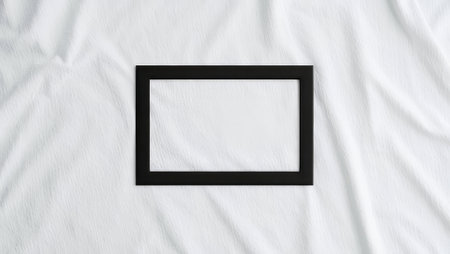 An empty wooden picture frame on a white cloth. generated by aiの素材