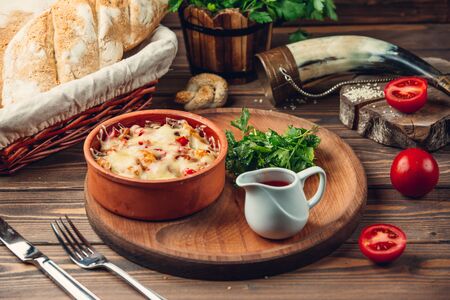 delicious casserole on a wooden standの写真素材