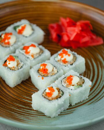 sushi with white rice and orange caviarの写真素材