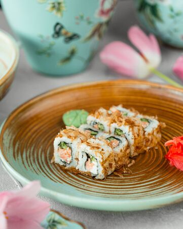 sushi with rice cucumber and sesame seedsの写真素材