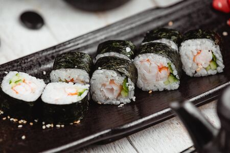 black wrapped sushi with riceの写真素材