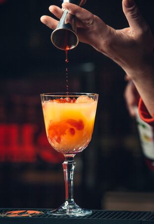 refreshing fruit cocktail with a touch of alcoholの写真素材