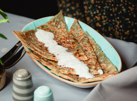 traditional azerbaijani kutabs with greens and gatygの写真素材