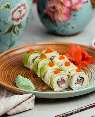 sushi with zucchini and orange caviarの写真素材