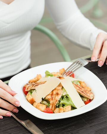 Chicken ceasar salad in the plateの写真素材