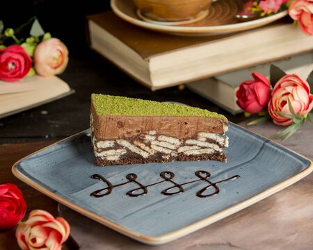 Sweet brownie with pistachio in the plateの写真素材