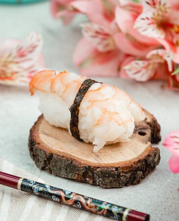 Open fish sushi on the wooden boardの写真素材