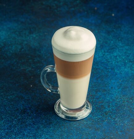 Iced caramel macchiato with whipped cream on topの写真素材