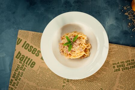 Spaghetti with cheese and turkey salami pieces