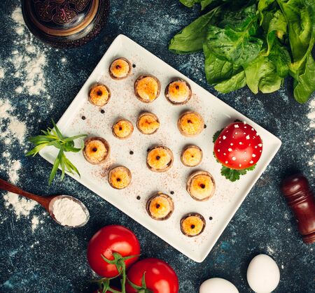 Top view of grilled mushroom filled with melted cheese