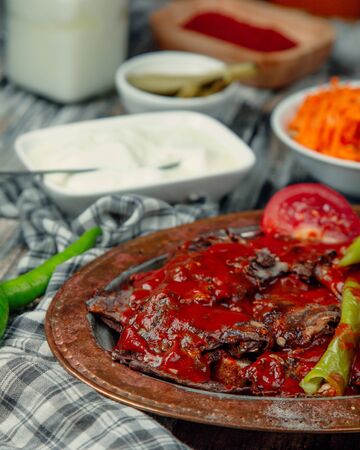 Roasted meat slices with green pepper and topped with ketchup 2の写真素材
