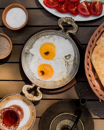 Omelette with sliced vegetables and bread 1の写真素材