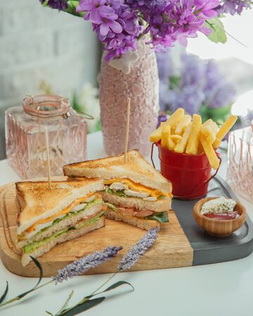 Club sandwich with french friesの写真素材